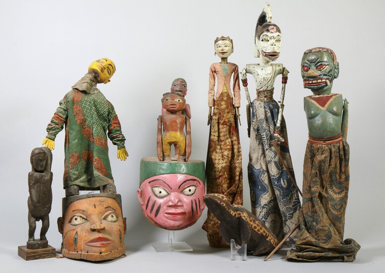 Nigeria, Yoruba, two Gelede masks with puppets, modern polychrome paint and local textiles.