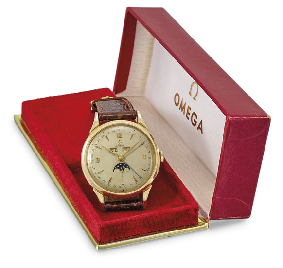 OMEGA. A LARGE GOLD-PLATED TRIPLE CALENDAR WRISTWATCH WITH MOON PHASES AND BOX, SIGNED OMEGA, REF. 2486-2, MOVEMENT NO. 13’385’474, CIRCA 1950