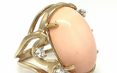 Oval shaped Angel Skin Coral and Diamond ring in 14K