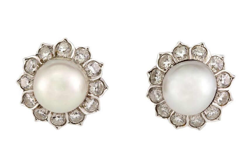 Pair of cultured pearl and diamond cluster earrings, each centring on a single cultured pearl measuring approximately 11mm diameter, within a surround of brilliant-cut diamonds, post fittings.