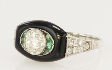 Platinum Art Deco design ring featuring a lozenge shaped ony...