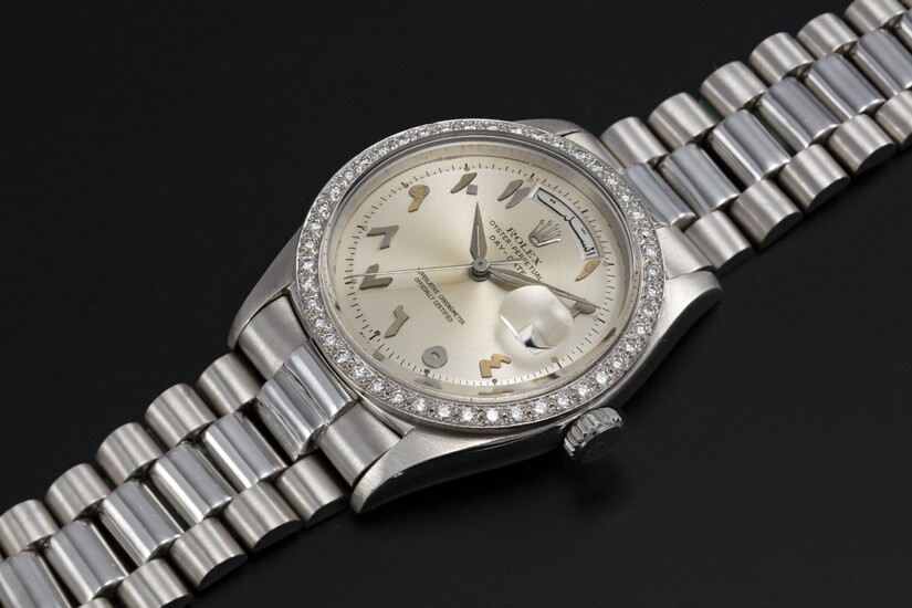 ROLEX "SCHEHERAZADE" REF. 1804, A PLATINUM OYSTER PERPETUAL DAY-DATE WITH DIAMOND-SET BEZEL AND ARABIC CALENDAR AND NUMERALS