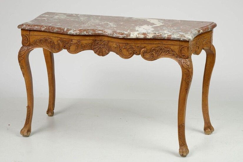 Regency style console in carved oak, resting on claw feet and topped with a red Breche marble shelf. Period: 18th century. Dim.:+/-117,5x73,5x53cm.