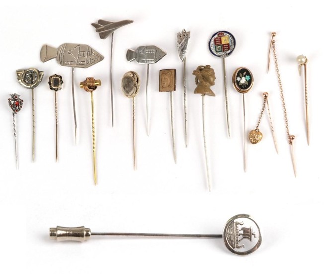 Seventeen Stick Pins, including a pearl that converts from a...