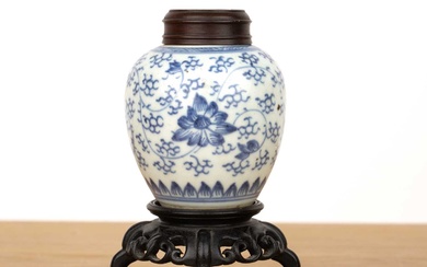 Small blue and white ginger jar with wood cover and...
