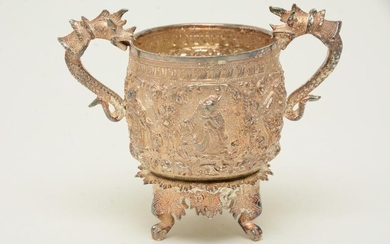 Southeast Asian two-handled silver cup with repousse