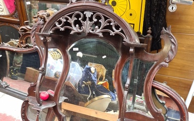 Star Lot : An impressive Antique large mirror featuring bev...