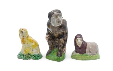 THREE EARLY STAFFORDSHIRE ANIMAL FIGURES Early 19th century,...