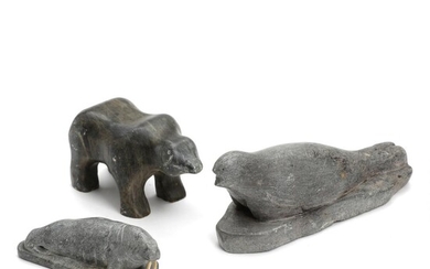 Taki, a.o. Three carved soapstone figures in shape of a seal, a...