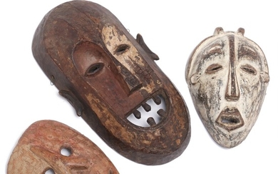 Three masks of carved patinated wood. D. R. Congo style. H. 18–31 cm. (3)