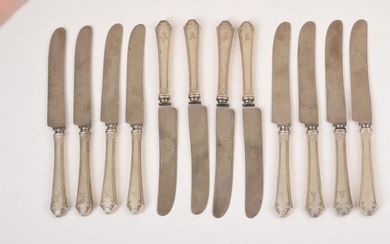 Twelve Sterling Handled Dinner Knives.