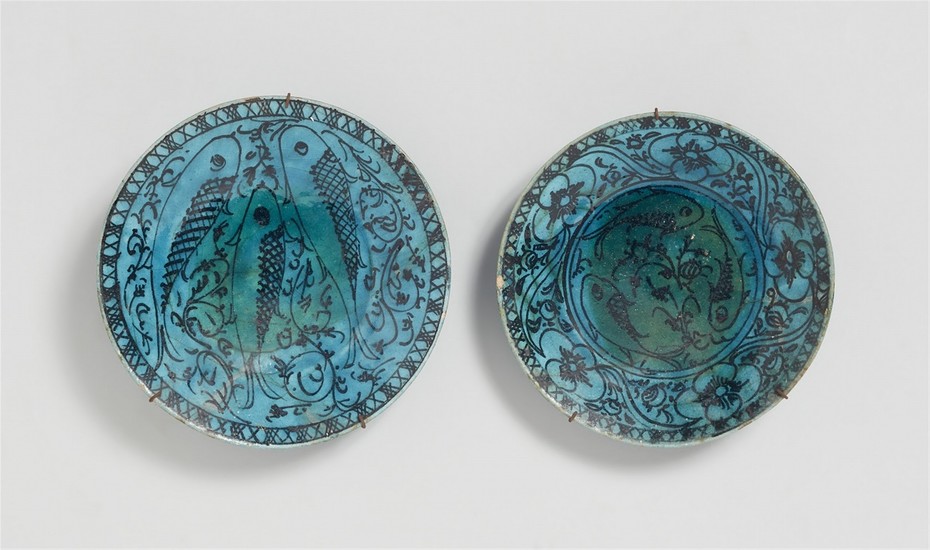 Two Iranian fritware bowls with fish decor