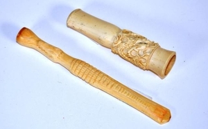 Two antique Chinese carved ivory cheroot holders one alligat...