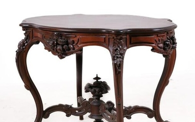 Victorian style carved walnut center table