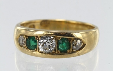 Yellow gold (tests 18ct) diamond and emerald five stone ring...