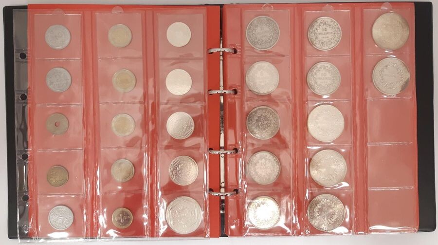 an album of French coins including 1 coin...