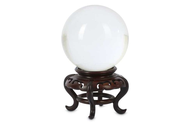 A LATE QING DYNASTY CHINESE CRYSTAL BALL. With a...