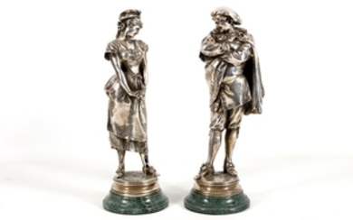 A pair of French silvered bronze figures of...