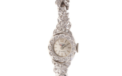 A Lady's Benrus Diamond Watch in 14K Gold