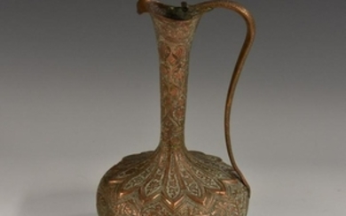 A 19th century Indian Mughal brown patinated bronze