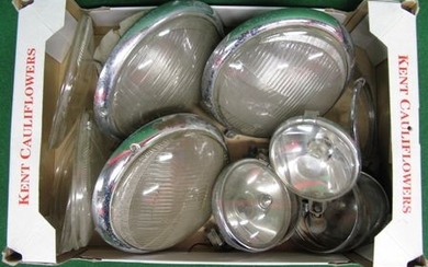 Box of headlamps, glass and chromed spot lamps