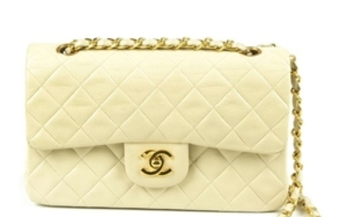CHANEL - a small cream Classic Double Flap handbag.