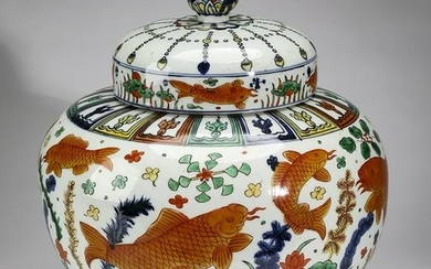 Chinese Ming style wucai covered jar with lotus pond