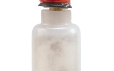 CHINESE WHITE JADE SNUFF BOTTLE In cylindrical form. Height 3". Simulated coral stopper.