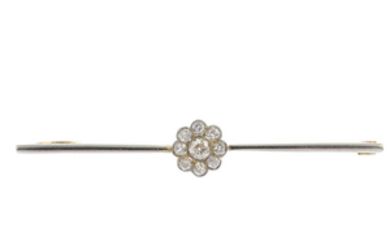 An early 20th century gold diamond bar brooch.