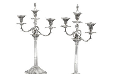 A pair of English silver three light candelabras