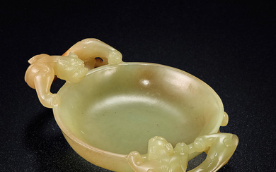 A fine and rare small yellow jade 'dragon' washer