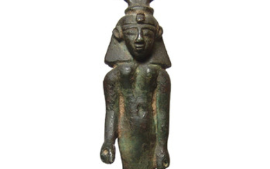 An important Egyptian bronze figure of Khonsu