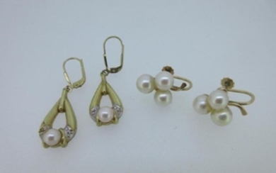 Two pairs of cultured pearl earrings both stamped for