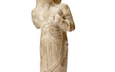 A stone figure of a standing Buddhist deity