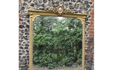 A 19th century French Louis XVI style large gilt wall mirror...