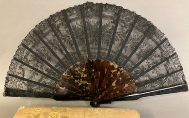 A 19th century tortoiseshell fan mounted with a black Chanti...