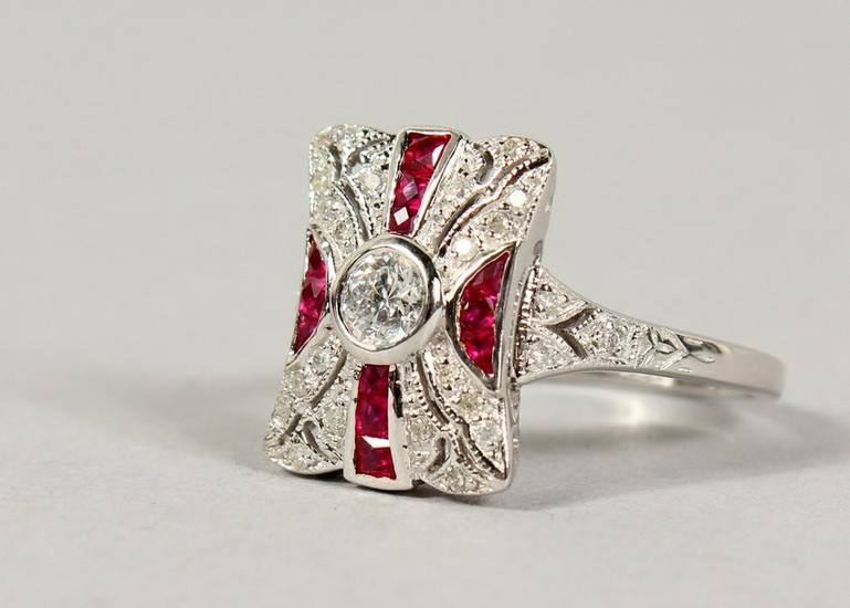 A 9CT GOLD, RUBY AND DIAMOND DECO STYLE RING.