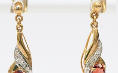 A 9ct gold pair of diamond and garnet ear pendants, 20mm, 1....