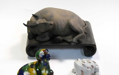 A Chinese Yixing -Style Stoneware figure of a recumbent water buffalo, 19/20th century