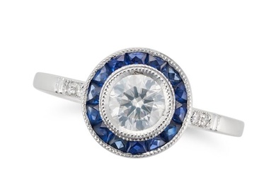A DIAMOND AND SAPPHIRE TARGET RING set with a round brilliant cut diamond of approximately 0.45