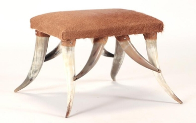 A FAUX ANTLER AND HIDE STOOL