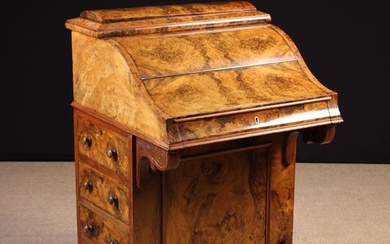 A Fine Quality Victorian Burr Walnut Davenport Desk. The back fitted with a pop-up letter rack with