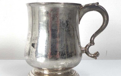 A George II silver mug with c-scroll handle, maker Edward...