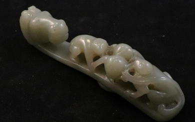A HETIAN JADE PENDANT CARVED WITH BEAST