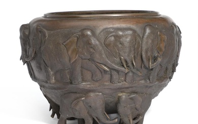 A Japanese 'elephant' bronze bowl cast with elephants in relief, feet in...
