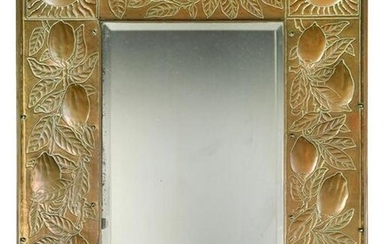 A Keswick School of Industrial Arts brass framed wall mirror