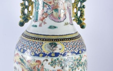 A LARGE 19TH CENTURY CHINESE CANTON FAMILLE ROSE TWIN HANDLED VASE Qing. 57 cm high.
