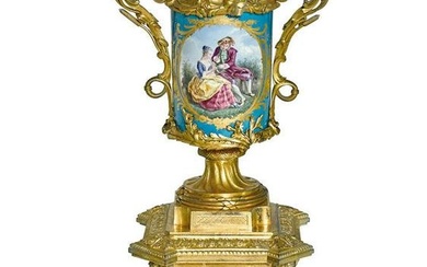A Louis XVI Style Gilt Bronze Urn Form Clock, 19th C.