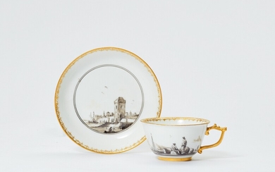 A Meissen porcelain cup and saucer with merchant navy scenes in black camaieu