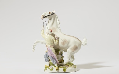 A Meissen porcelain model of a Turkish man taming a rearing horse